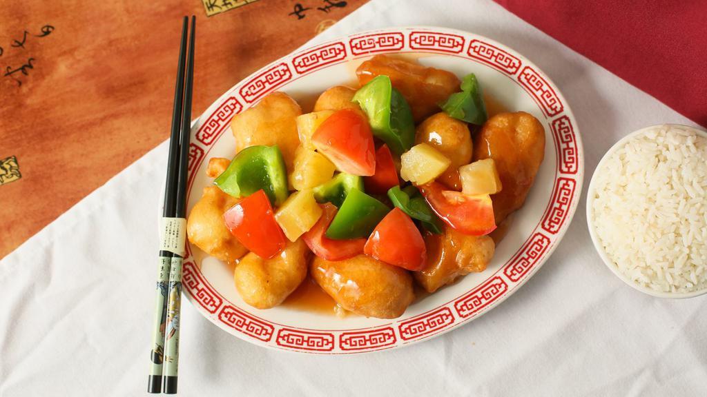 Sweet & Sour Chicken · Deep fried chicken served with pineapple, green pepper and tomato in our homemade sauce.