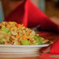 Cashew Chicken Ding · Diced chicken breast stir fried with vegetables and topped with cashews.