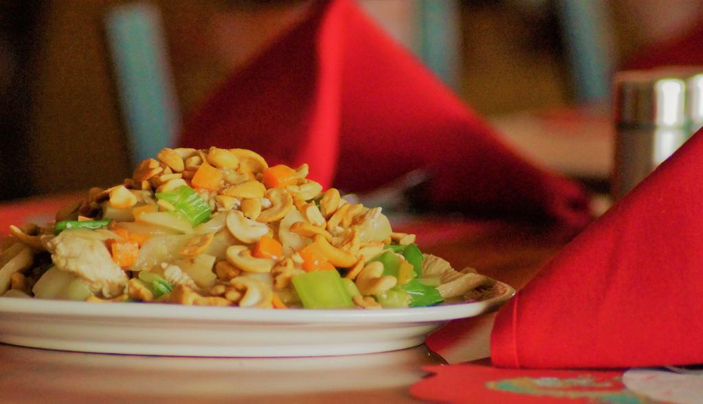 Cashew Chicken Ding · Diced chicken breast stir fried with vegetables and topped with cashews.