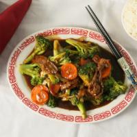 Beef & Broccoli · Tenderloin beef stir fried with fresh broccoli, carrot and onion in a dark sauce.