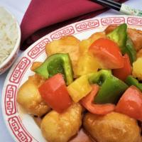 Sweet & Sour Pork · Fried pork loin with pineapple, green pepper and tomato mixed in our homemade sweet and sour...