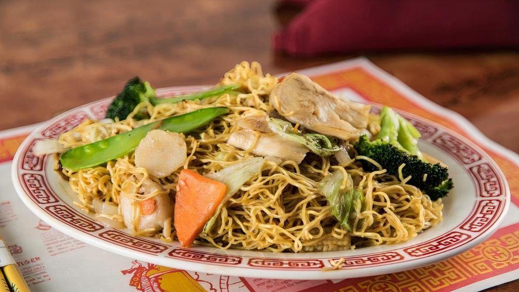 Pork Lo Mein · Pork loin stir fried with fresh Chinese vegetables in a light sauce mixed in with pan fried noodles.