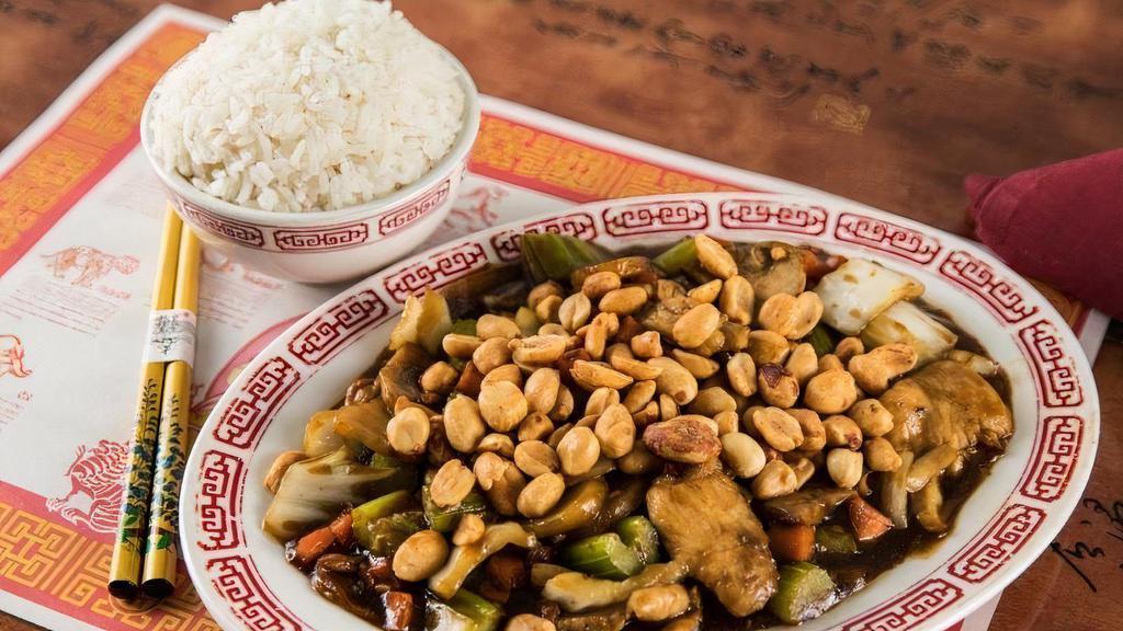 Kung Pao Beef · Beef tenderloin stir-fry with diced Chinese vegetables, topped with peanuts in a dark sweet sauce.