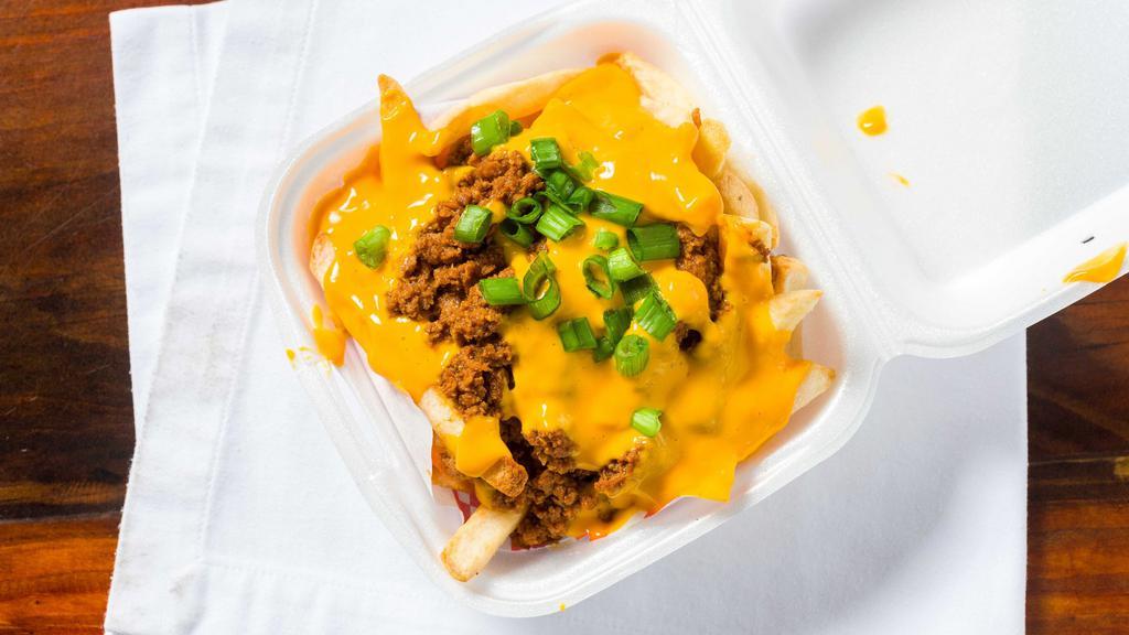 Air Fried Nacho Fries · Air fried French fries with beef nacho meat, nacho cheese and topped with green onion!!!.