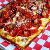 8 Square Detroit Cadillac · Wisconsin brick cheese, Old World pepperoni on top, ham, bacon, sausage, house red sauce on ...