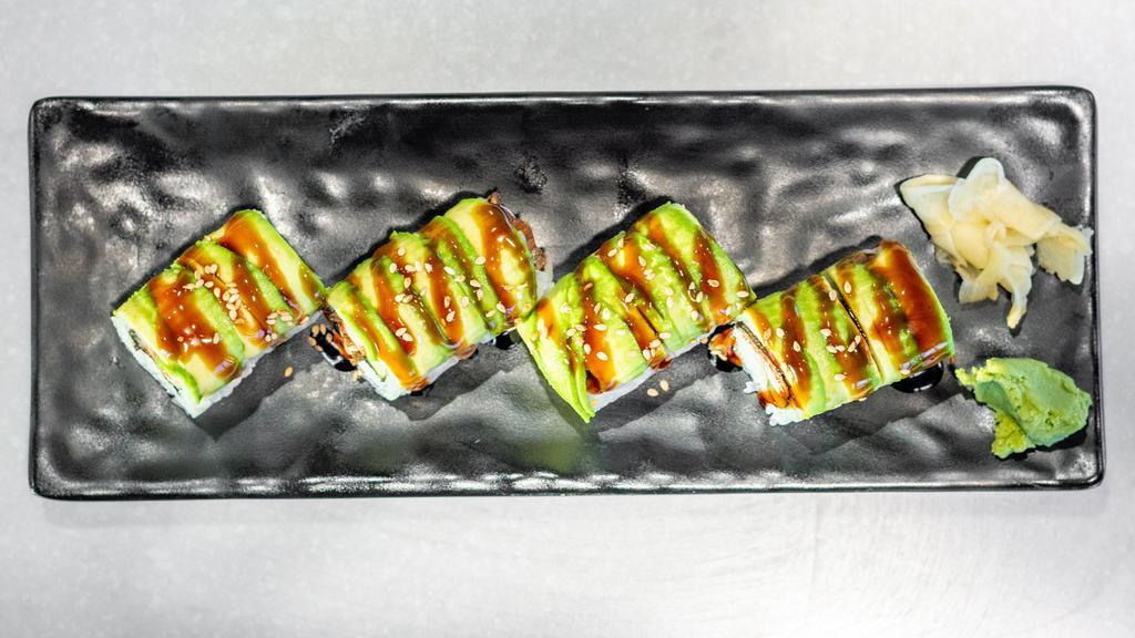 Caterpillar Roll · (8 Pieces) Broiled eel, imitation crab, and cucumber topped with sliced avocado, eel sauce, and sesame seeds.