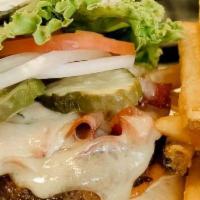 Cheese Burger (½ Lb) · 1/2 LB Burger of Fresh Nebraska Beef. Served with pickles.