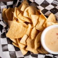 Queso & Chips · Jack Cheese, tomatoes, green chilis, red onion and cilantro simmered to perfection and serve...