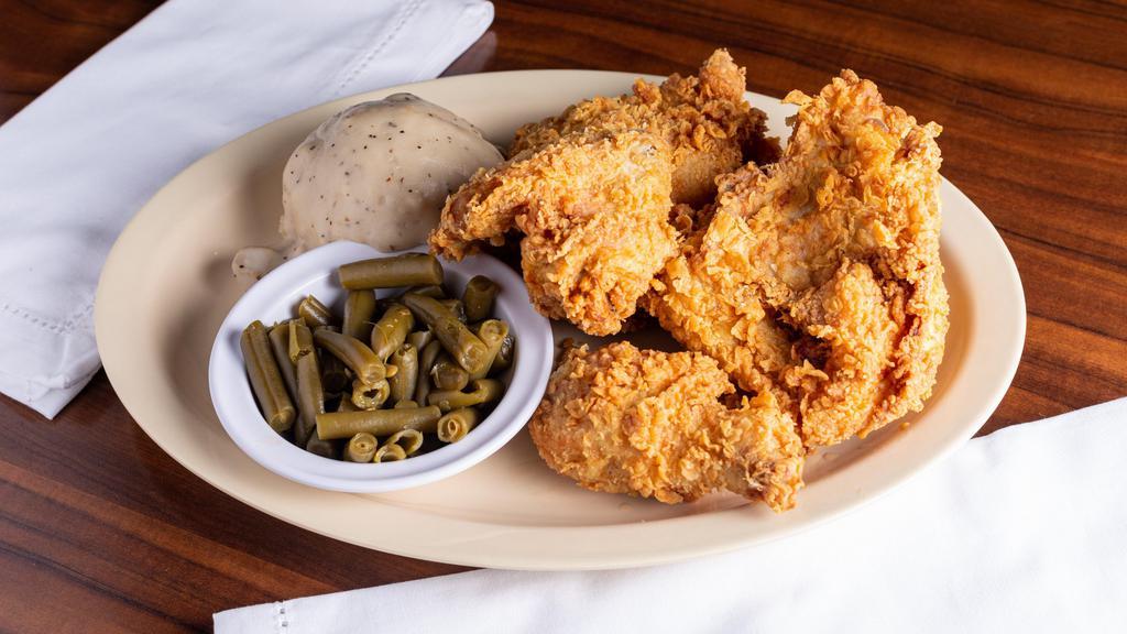 Fried Chicken Dinner - 4 Piece · Hand-breaded, hand-cut, and seasoned to perfection.  Includes, beast, wing, thigh, and leg. Served with Side Salad.