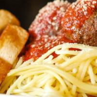 Spaghetti & Meatballs · A generous portion of spaghetti and four meatballs. Served with a side salad and garlic bread.