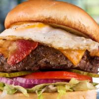 Hangover Burger · Topped with cheddar, smoky bacon and a freshly fried egg, served atop shredded lettuce, toma...