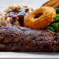 12 Oz. Ny Strip Steak · USDA Choice, lean and extra tender. Served with an O-Ring, grilled garlic bread, plus your c...