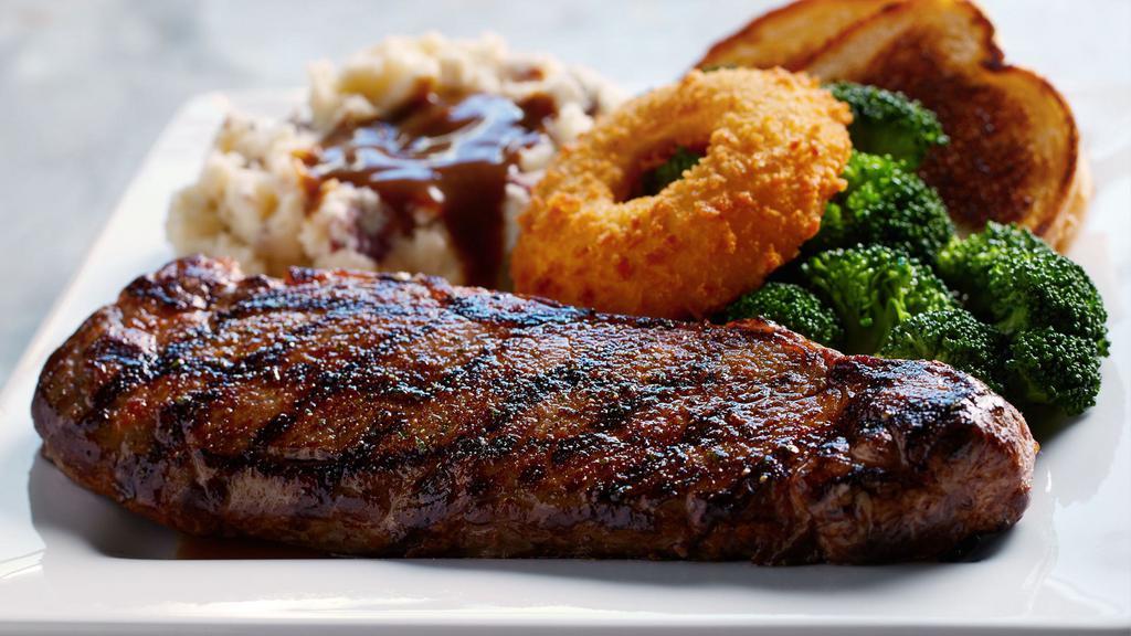 12 Oz. Ny Strip Steak · USDA Choice, lean and extra tender. Served with an O-Ring, grilled garlic bread, plus your choice of two regular sidecars.