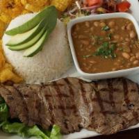 Carne Asada · Grilled Top Round Steak, w/ Rice, Beans, Fried Green Plantains, Andes Curtido