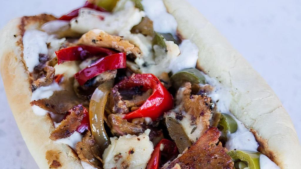 Pepperjack Steak Sandwich · shaved seitan, cashew pepper jack cheese, sautéed peppers and onions, pickled jalapeños, garlic mayo, grilled garlic ciabatta