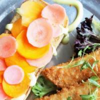 Lemongrass Chick’N Sandwich · crispy tofu chick’n, pickled carrots & radish, lemongrass mayo, field greens, cilantro, toas...