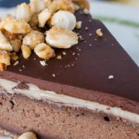 Pb Candy Bar Cheesecake (Gf) · graham cracker crust, coconut caramel, chocolate peanut butter filling (coconut whip upon re...