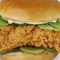 Classic Chicken Sandwich · HAND CUT AND BREADED CHICKEN BREAST TOPPED WITH LETTUCE, PICKLES AND MAYO. SERVED ON A FRESH...