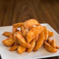 Sm Jojo'S Wedges · LAREGE SEASONED POTATO WEDGES