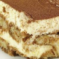 Tiramisu · Ladyfinger cookies soaked in espresso, layered with mascarpone cheese and topped with cocoa ...