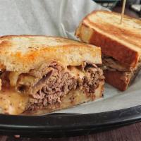 Bistro Roast Beef · Roast beef, provolone cheese, grilled onion, and bistro sauce on grilled country buttermilk.