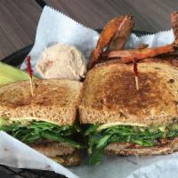 Grilled Maguro · Grilled yellowfin tuna, smoked Gouda cheese, avocado spread, spinach, tomato, red onion, and...