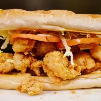 Shrimp Po'Boy · Fried shrimp dressed with lettuce, tomato, and spicy tartar, served on a french roll. Served...