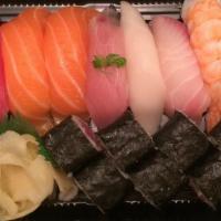 Sushi Deluxe · 9pcs sushi & 1 tuna roll

Consumer Advisory: eating raw fish, shellfish and eggs may increas...