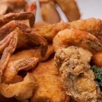 Seafood Platter · 6 pc jumbo shrimp 2 pc cod  2  pc catfish  2 pc tilapia