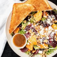 Roasted Sweet Potato & Beet Salad · Spring mix with roasted sweet potatoes, sliced beets, walnuts, and feta cheese. Served with ...