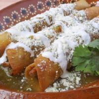 Flautas · Four fry roll up taquitos of your choice. top  with lettuce, sour cream, queso fresco & salsa