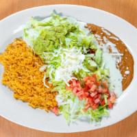Burrito Mexicano · A flour tortilla stuffed with pork, cooked with tomatoes, onions, bell peppers and topped wi...