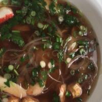 Seafood Pho · Rice noodle soup with imitation crab, squids, fish balls, and shrimps.