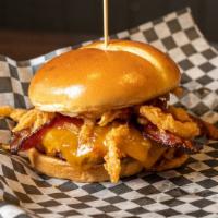 Hickory Cheddar Burger · Midwest Beef / Wisconsin Cheddar / Pecanwood Smoked Bacon / Fried Onion Straws / Classic BBQ...