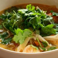 Tom Yum  · Thai spicy lime sour soup, shrimp, assorted vegetables, cilantro