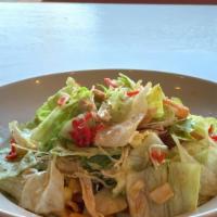 Chicken Salad · Iceberg lettuce, crispy wontons, fried glass noodle, red ginger, green onion, and homemade s...