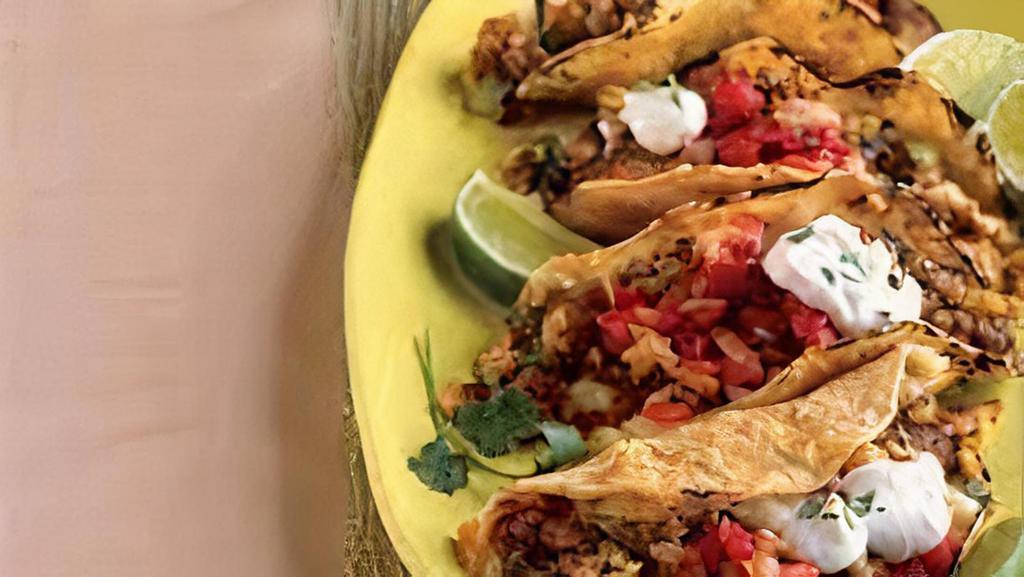 Breakfast Tacos For A Group (5 People) · Scrambled eggs with choice of chorizo sausage bacon with toppings of pico de gallo and cotija cheese. Served with home fry potatoes and salsa.