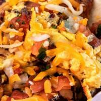 Breakfast Taco · Scrambled eggs, fried potatoes and pico de gallo served on a corn tortilla with your choice ...