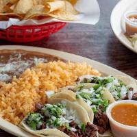 3 Street Tacos · Three street tacos with your choice of meat, cilantro, onions, rice and beans.