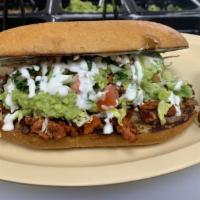 #10. Torta · Choose your meat, lettuce, tomatoes, fresh cheese and guacamole.
