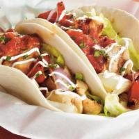 Soft Tacos · Choose your meat, lettuce, tomatoes, sour cream and cheese.