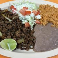 #1. Asada Plate  · Steak meat Served with rice and beans & Tortillas.