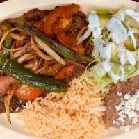 #8. Bistec A La Mexicana · Thin steak, cooked with juicy tomatoes, onions, jalapeños and fresh cheese served with torti...