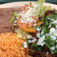 #5. Barbacoa Plate  · Comes with cilantro, onions, and tortillas. Served with rice and beans.