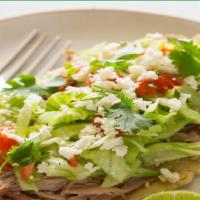 Huaraches · Choose your meat, lettuce, tomatoes, cheese and sour cream.