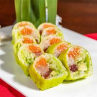 Green Bay Roll · Yellowtail, tuna, salmon, cucumber, avocado wrapped with soy paper, topped with chef's sesam...