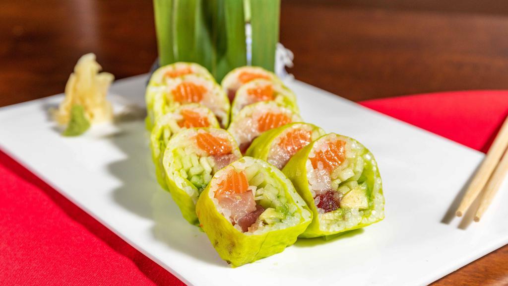 Green Bay Roll · Yellowtail, tuna, salmon, cucumber, avocado wrapped with soy paper, topped with chef's sesame wasabi sauce.
