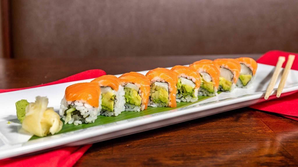 Fox Point Roll · White tuna, cucumber avocado roll, topped with salmon.