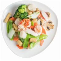 S 2. Seafood Delight · Fresh shrimp, scallops & crab meat with mixed vegetables in a white sauce.