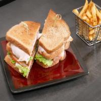 Triple Decker Club · Smoked turkey, applewood smoked bacon,lettuce,tomato with sriracha mayo on white toast.